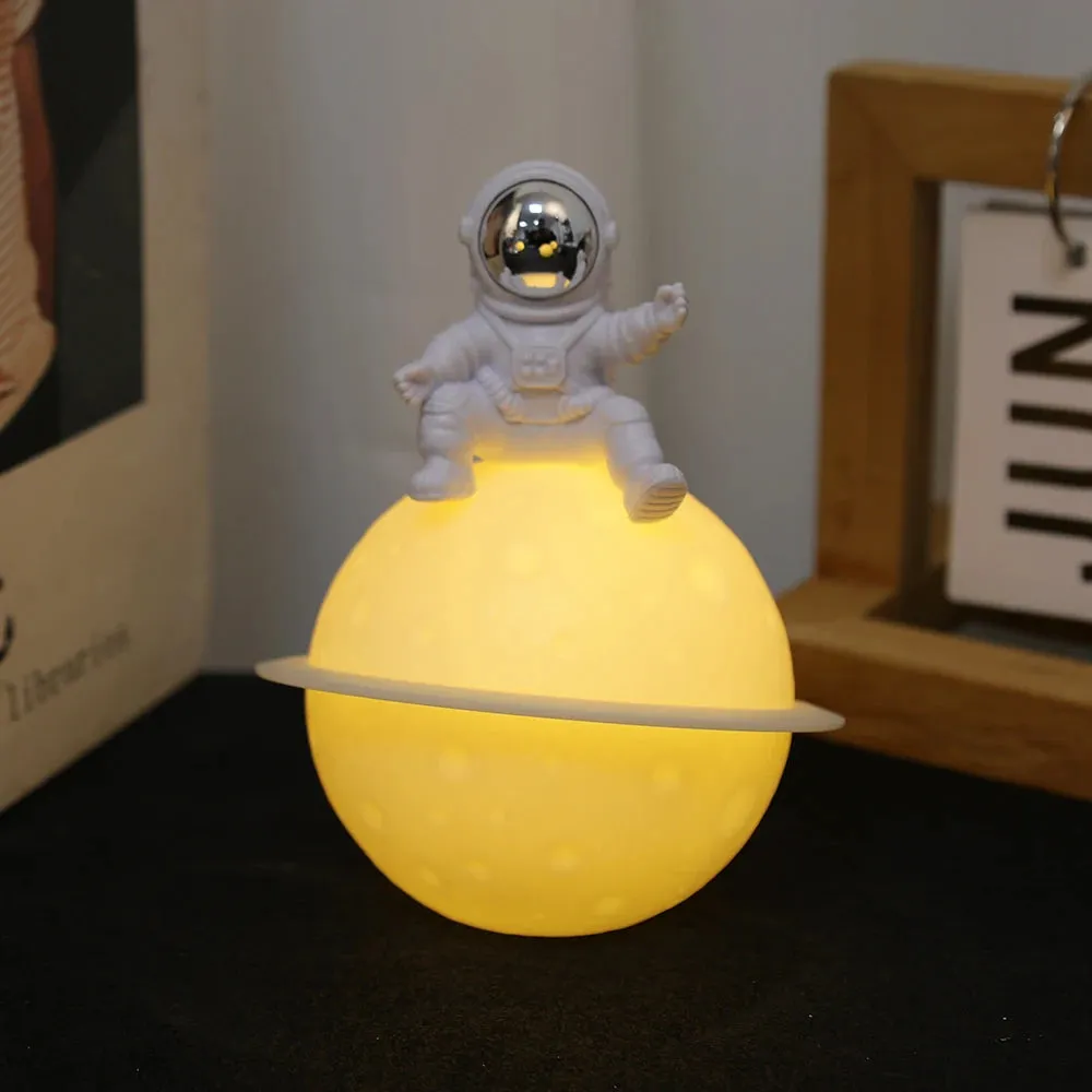 Astronaut Sitting in The Moon Night Light