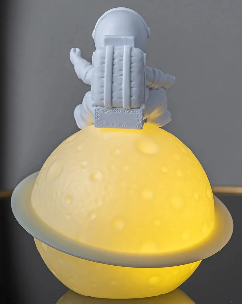 Astronaut Sitting in The Moon Night Light