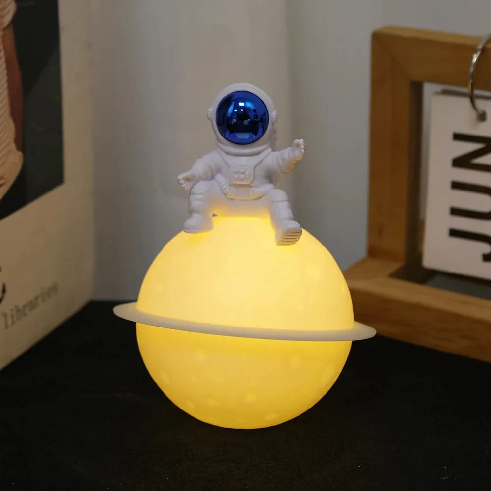 Astronaut Sitting in The Moon Night Light