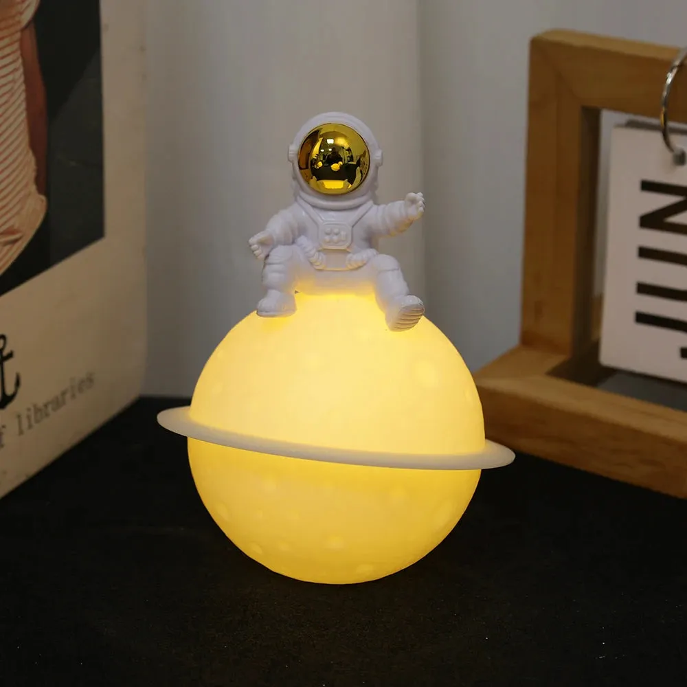 Astronaut Sitting in The Moon Night Light